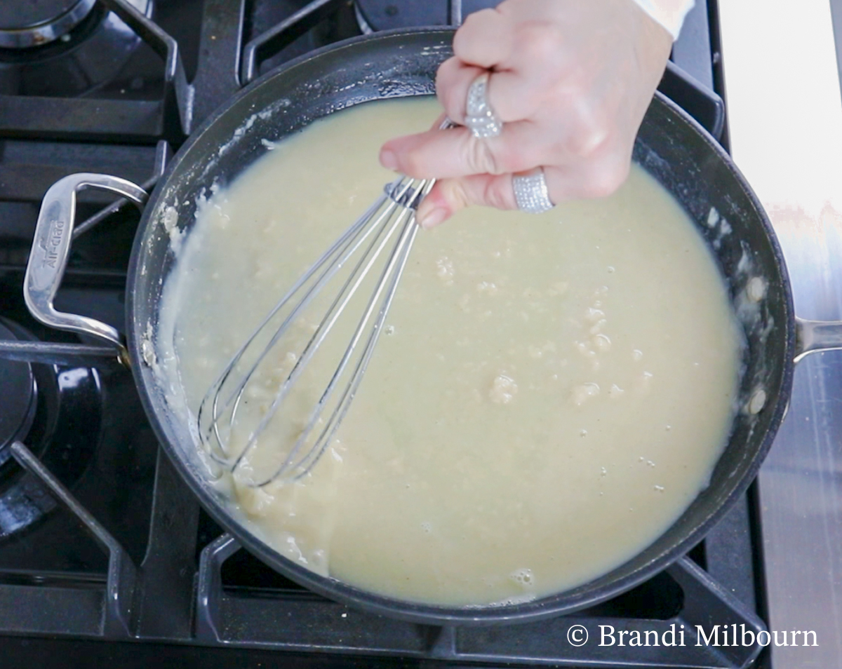 Begin to add a small amount of the remaining 2 cups of chicken broth, stirring constantly to remove chunks. When smooth, stir in the remaining broth. Stir 1-2 minutes.