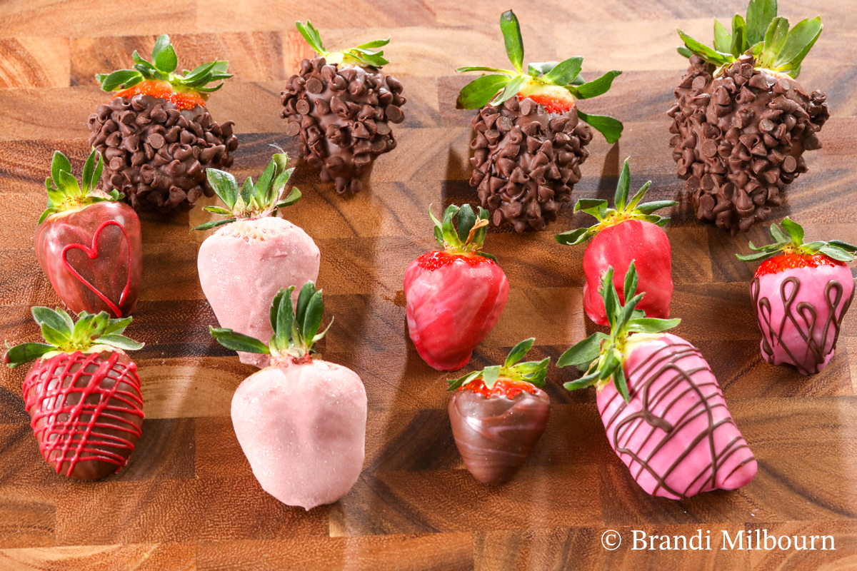 Variety of chocolate covered strawberries, some chocolate chips, Candy coating and drizzled with chocolate