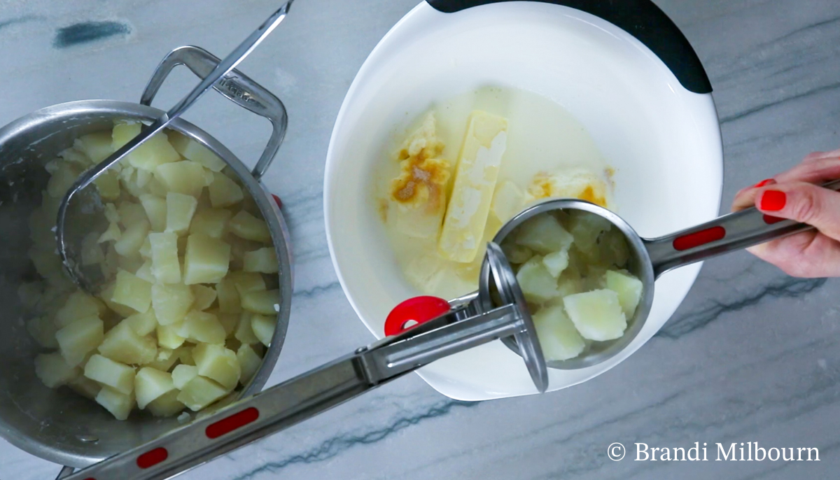 All ingredients placed into bowl before icing potatoes over the top