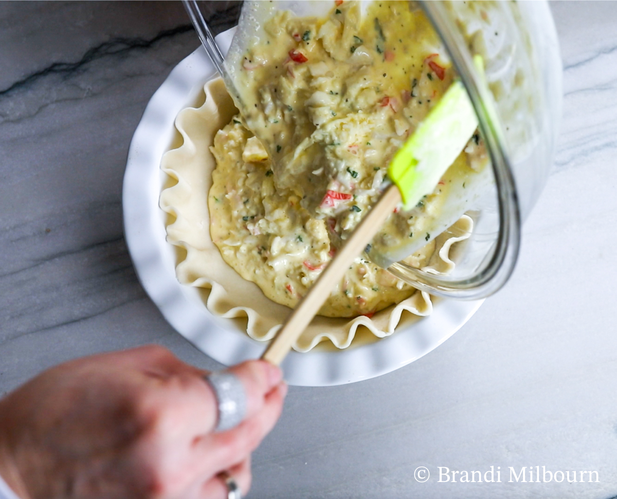 pour crab egg mixture into pie crust