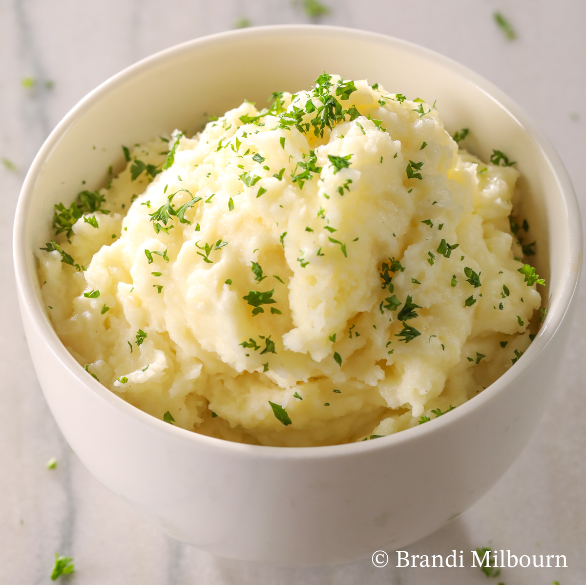 Bowl full of garlic mashed potatoes