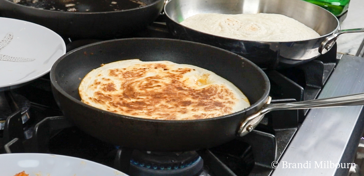 cooking quesadillas until golden